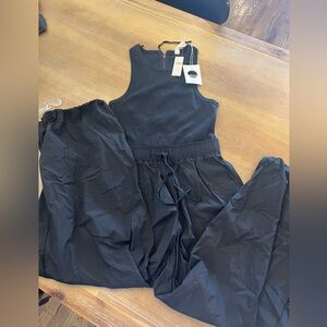 Black Sleeveless Jumpsuit - Modern Relaxed Fit